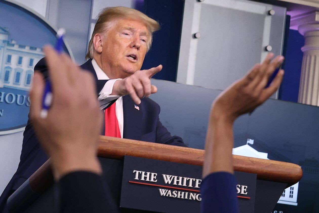 President Donald Trump speaking at the podium